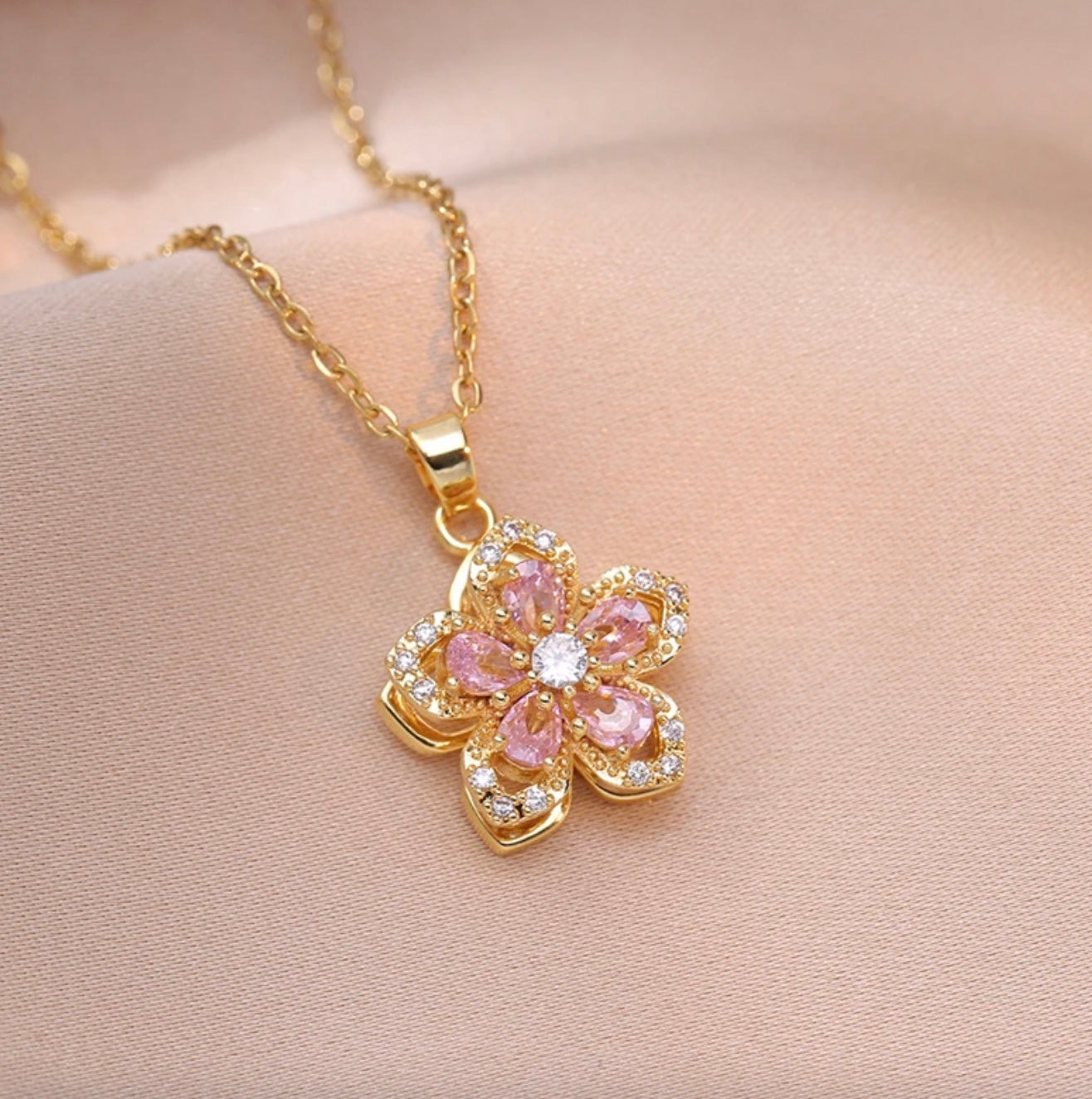 Stainless Steel Light Pink Flower Rotating Necklace