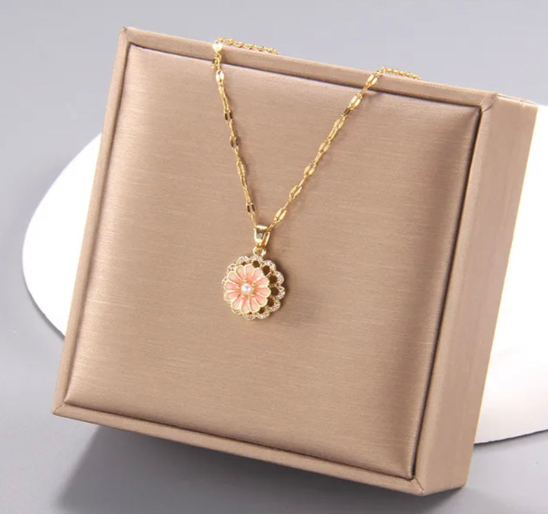 Stainless Steel Pearl Centre Pink Flower Rotating Necklace